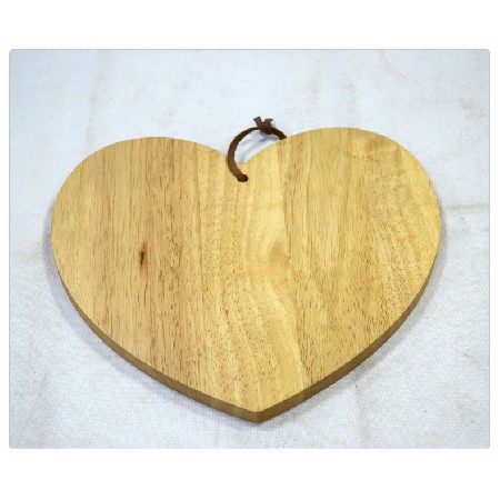 Heart shaped wooden vegetable board